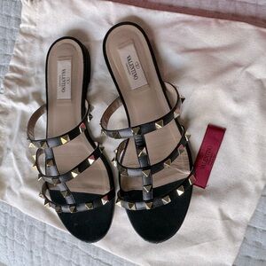 Valentino Garavani
Rockstud Caged Flat Slide Sandals
